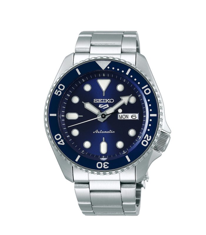 The Seiko SRPD51K1 blends sporty style with everyday reliability. Featuring a deep blue dial, durable stainless steel case, and automatic movement powered by your wrist, it’s built for both casual wear and active days. A modern take on the iconic Seiko 5 design, it offers bold looks, day-date display, and dependable performance without needing a battery.